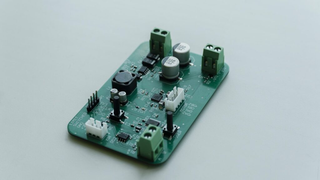 Green circuit board with electronic components and connectors