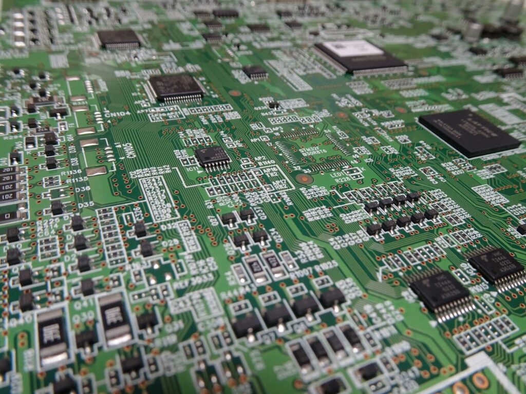 Close-up view of a complex green circuit board