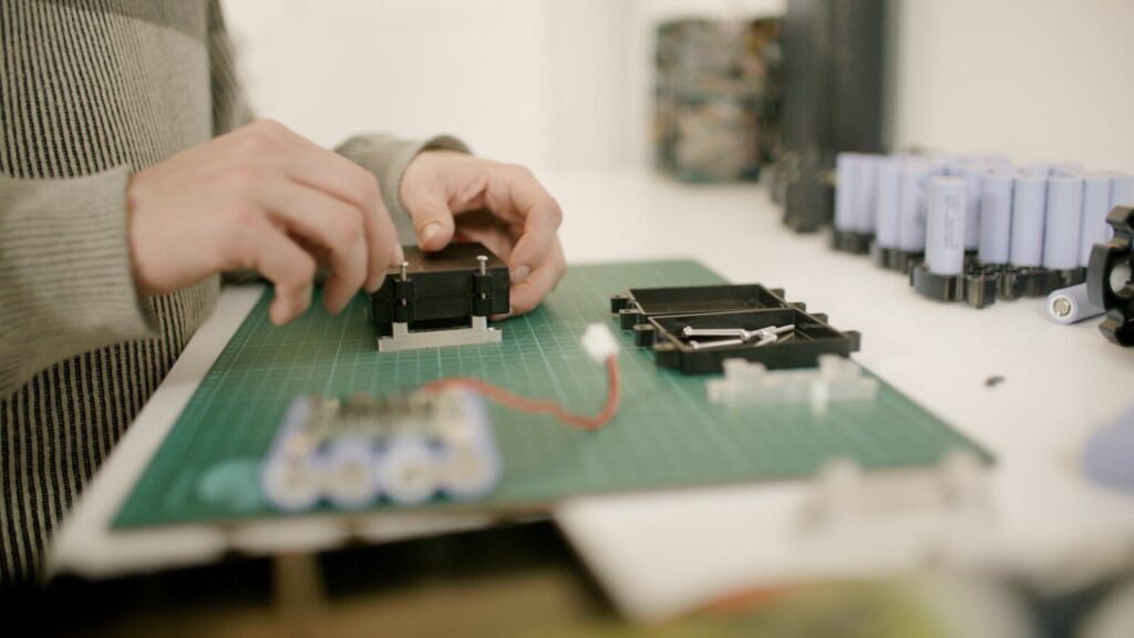 a person working on a project on a table