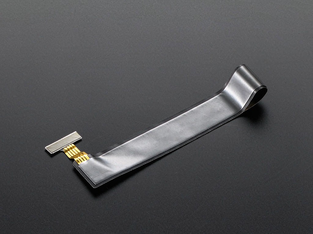 EMI shielded flexible PCB with silver-loaded shielding film