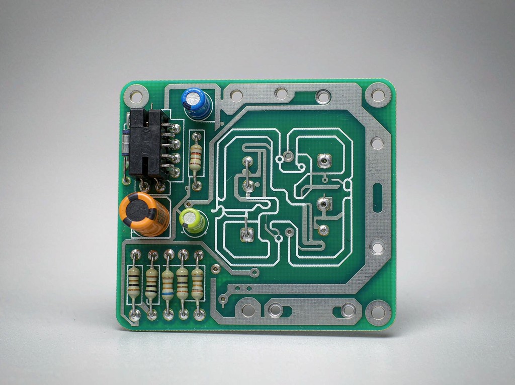 Single-sided rigid PCB with through-hole components